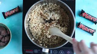 NO BAKE MARS BAR CHEESE CAKE RECIPE  Gregs Kitchen [upl. by Eltsirc]